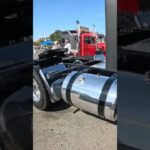 Black Freightliner Cascadia from the NFT trucking company and a custom Kenworth W900 #truck